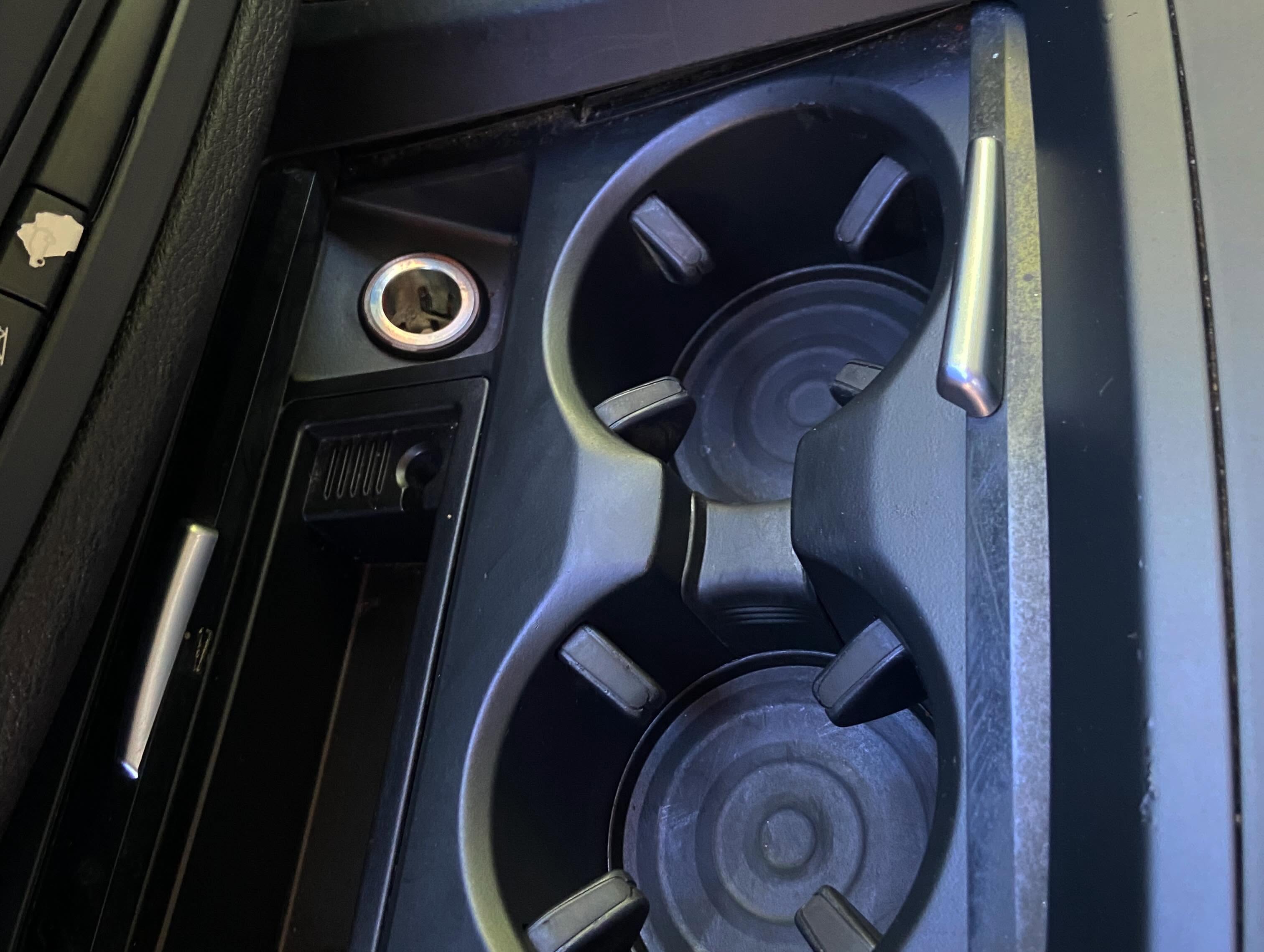 Cleaned BMW cupholders after detailing