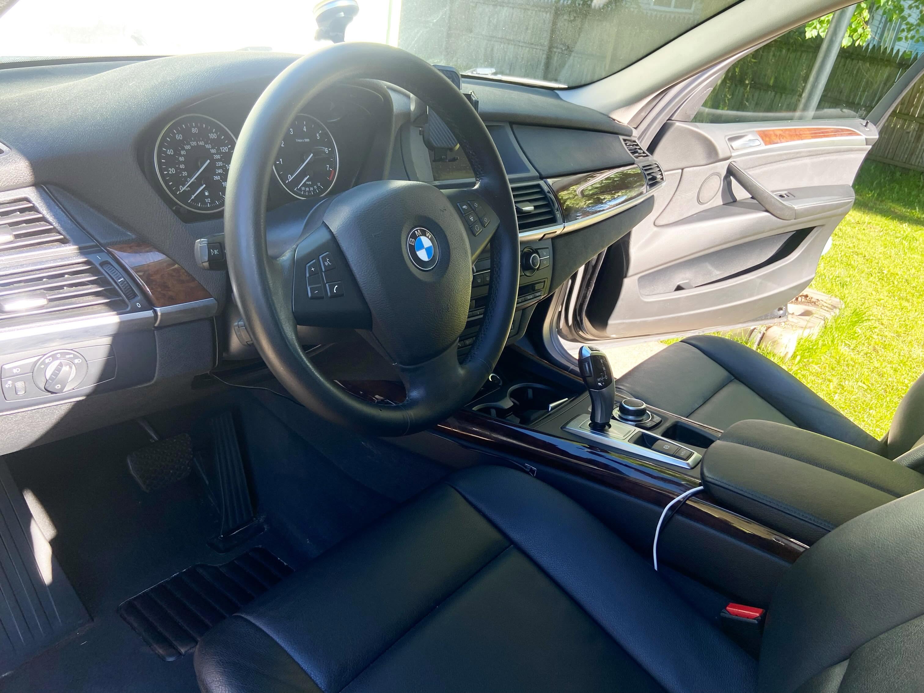 Clean BMW front driver cabin after detailing
